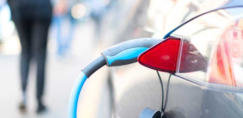 an-electric-car-is-charged-2021-08-26-18-34-26-utc